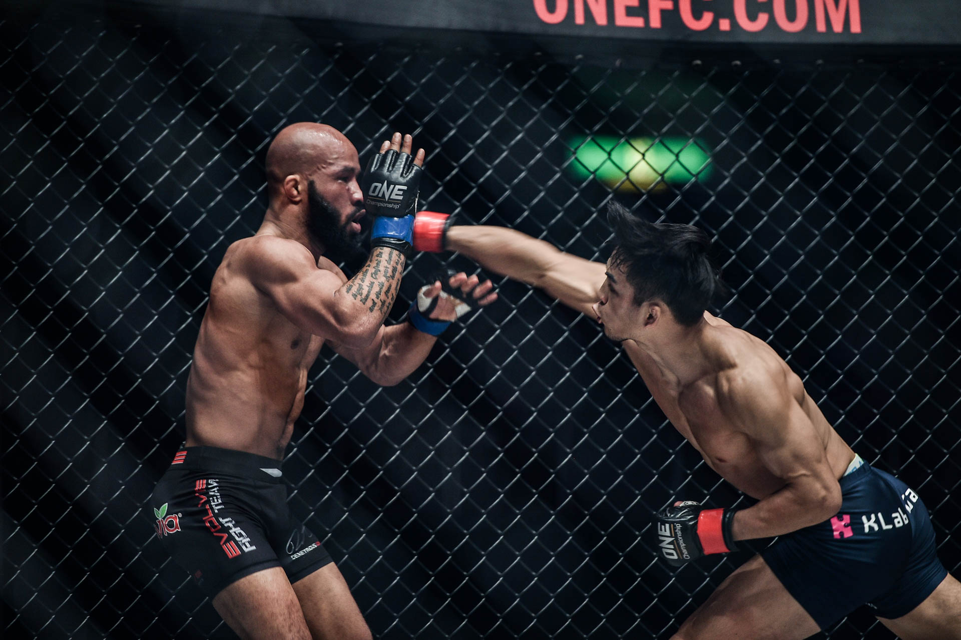 Yuya "Little Piranha" Wakamatsu battles Demetrious "Mighty Mouse" Johnson