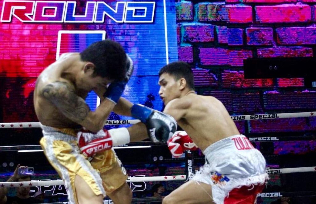World-ranked Filipino fighter Johnmichael Zulueta lands an unintentional left on the balls of Thailand fighter Sittichai Namnual Wednesdy night at Spaceplus Bangkok, a mishap without repercussions.